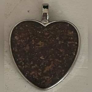 Vintage 1.25” silver tone and bezel set bronzite heart shaped pendant